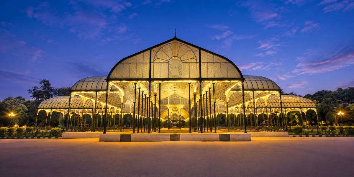Lalbagh Glass House lit up at twilight in Bangalore